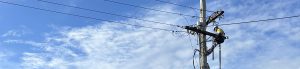 Level 2 Electrician Fixing overhead power lines near me.